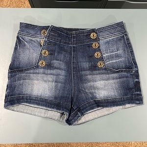 Express dark blue denim shorts with anchor buttons. Size 4 women’s.